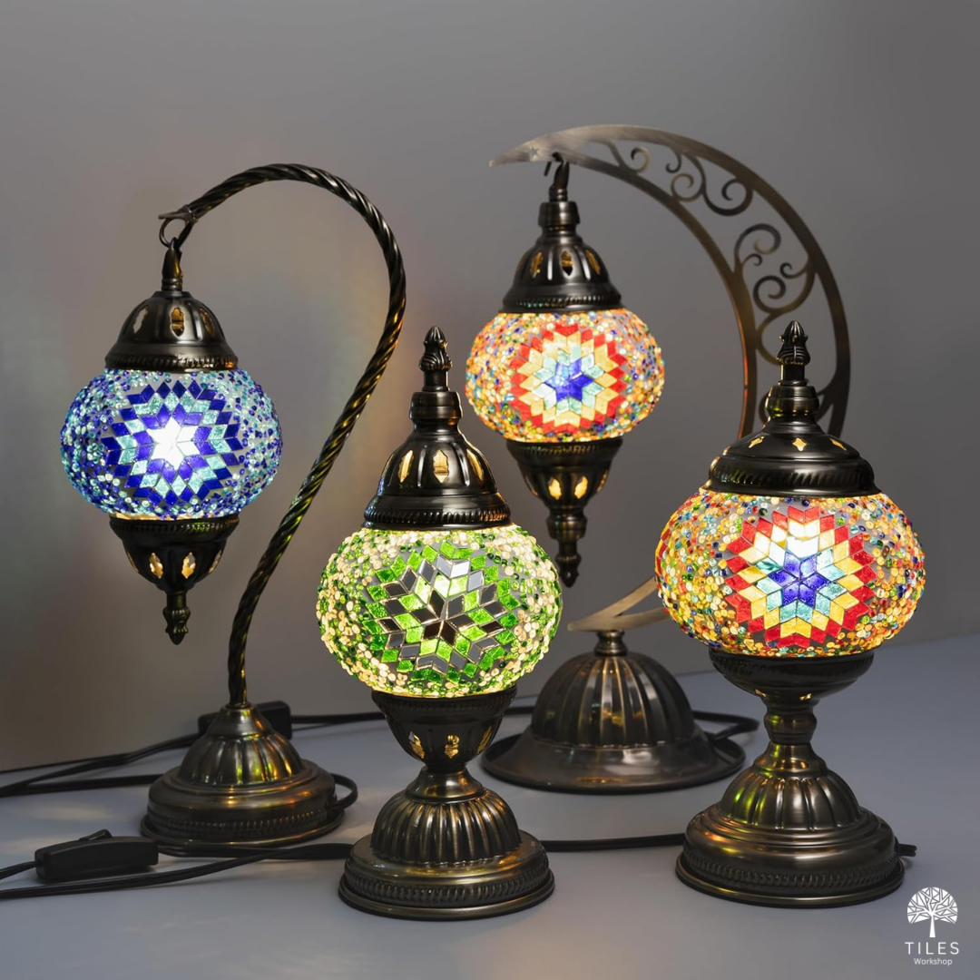 Collection of mosaic lamp kit designs showing blue swan, green table, and rainbow multicolor turkish mosaic lamps illuminated by Tiles Workshop